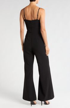 A fresh alternative to the usual party frock, this flare-leg jumpsuit exudes elegant charm with a lavish bow at the bust and a curve-skimming fit. 31" inseam; 28" leg opening; 53" center front length (size 8) Back zip closure Sweetheart neck Adjustable straps Partially lined 95% polyester, 5% spandex Machine wash, tumble dry Imported Fitted Strapless Wide-leg Jumpsuit For Evening, Chic Fitted Flare Jumpsuits And Rompers, Glamorous Fitted Wide Leg Jumpsuits And Rompers, Evening Wide-leg Fitted Jumpsuit, Strapless Wide Leg Jumpsuit For Date Night, Fitted Strapless Wide-leg Jumpsuit For Date Night, Date Night Strapless Wide-leg Jumpsuit, Date Night Strapless Wide Leg Jumpsuit, Elegant Fitted Strapless Jumpsuit With Wide Leg