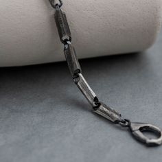 "Totally handmade heavy link chain bracelet for men in oxidized sterling silver with a unique clasp at closure. This brutalist bracelet is a great choice as a Birthday gift for men, for him. 100% handcrafted with love! * Metal: High-quality Sterling Silver 925 * Finish: Oxidized Silver * Style: Link * Width: 5mm * Length: 7-8.5 inches. Please let us know if you need a different length. Delivered in an elegant gift package. S H I P P I N G All orders are shipped via FedEx for speed and security ( Oxidized Finish Sterling Silver Link Bracelet As Gift, Chain Bracelet Men, Mens Chain Bracelet, Men Bracelets, Bracelet Men, Christmas Gifts For Him, Silver Chain Bracelet, Birthday Gift For Him, Mens Birthday Gifts