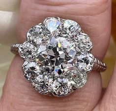 Antique Edwardian 1900s GIA H-VS2 3.38ctw OLD European Cut Diamond Cluster Platinum Ring  This French-made cluster ring screams Edwardian, circa 1900, and showcases an Old European cut diamond with large cut facets that cause it to flash with slow and stunning sparks of colorful fire. Old cut diamonds can be dangerous. The more of them you see, the more of them you desire to own! Old Cuts like these are more like individual works of art. The breathtakingly beautiful dazzler features a gorgeous 1.76ct Old Euro cut H Color and VS2 clarity, a very unusual HIGH color for that period (most Diamonds were L-M color), It is SUPER BRILLIANT, it's white, clean and tons of SPARKLE! The magical Old Cut Diamond, its brilliance is tantalizing. Certified by GIA #2215083318. The measurements of the diamon Large Diamons Made Into Clusters, Double Diamond Ring, European Cut Diamond Engagement Ring, Citrine Ring Engagement, European Cut Diamond Ring, Estate Diamond Jewelry, Cluster Engagement Ring, Dream Engagement Rings, Double Halo