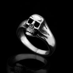 Can be very cool pinky ring. Sterling Silver Small Old Skool Skull Ring. Shiny polished on the surface and oxidized in the gaps. Average Silver Weight: 5 gr. Sizes Available: 47-60 EUR / 4-9 US Other sizes might be available by request:) Unisex. More Skull rings : www.etsy.com/shop/MrSmithJewelry?ref=hdr_shop_menu&search_query=Skull+Ring Back to my shop : www.etsy.com/shop/MrSmithJewelry For more rings : www.etsy.comshop/MrSmithJewelry?ref=hdr_shop_menu§ion_id=18467445 Handmade Made with sty Edgy Halloween Rings For Gift, Punk Skull Rings As Gift, Edgy Skull Ring As A Gift, Edgy Skull Ring For Gift, Classic Skull Ring As Gift, Jewelry Design Studio, Mens Pinky Ring, Skull Rings, Small Skull