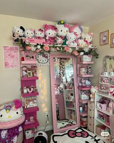 a room with hello kitty decorations on the wall