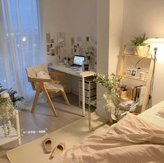 a bedroom with a desk and chair in it