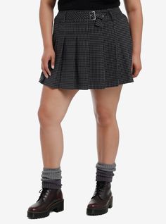 Skirt season is here! Give your look a cute and edgy flair with this piece! This skirt features a black and grey houndstooth design and comes with buckle detailing around the waist.Please note: Style is fitted with no stretch; size up for a looser fit.64% polyester; 34% rayon; 2% spandexWash cold; dry lowNon-stretch materialLength: 18''Imported Model is 5'10''Model wears size 1 Hot Topic Plus Size, Hot Topic Skirts, Goth Skirt Shien, Pleated Skirt Plus Size, Gothic Pleated Mini Skirt, Plus Size Hot, Goth Plaid Skirt, Skirt Plus Size, 90s Aesthetic