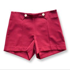 High Waisted Dress Shorts In A Deep Red Color With Gold Button Accents. Trouser Like Material. Brand New With Tags. Never Worn. Excellent Condition: No Existing Snags, Rips, Or Stains. Formal Fitted Shorts With Belt Loops, Elegant Shorts With Buttons, Elegant High Waist Shorts With Button Closure, Elegant High-waisted Shorts With Button Closure, Elegant Short Bottoms With Button Closure, Chic Fitted Shorts With Button Closure, Elegant Short Bottoms With Buttons, Classic Red Summer Bottoms, Classic Buttoned Short Bottoms