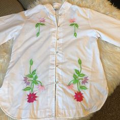 Such a gorgeous piece!  White, button down, bell flared sleeves, hand embroidered flowers on front,back and sleeves.  Made in the Philippines.  Asian, boho, hippie Bohemian Spring Tops With Buttons, Spring Buttoned Tunic Top, Spring Button Tunic Top, Spring Tunic Top With Buttons, Bohemian Embroidered Button-up Shirt, Casual Embroidered Top With Boho Collar For Spring, Spring Bohemian Blouse With Buttons, Bohemian Spring Blouse With Buttons, Bohemian Long Sleeve Shirt With Buttons