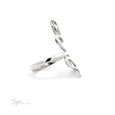 This silver snake ring is sure to slither its way into your heart. Coiled and ready to strike, this serpent is a perfect picture of charm and confidence—with just a touch of underlying danger. This delicate ring is an excellent testament to its wearer's inner strength and ferocity. Because of its simplicity, this ring pairs perfectly with any look, whether you're a snake lover or simply looking for the courage of one. Material: .925 Sterling Silver Dimensions: 2mm band, 30mm snake height Snake Lovers, Snake Ring Silver, Snake Ring, Delicate Rings, Inner Strength, 925 Sterling Silver, Band, Sterling Silver, Silver