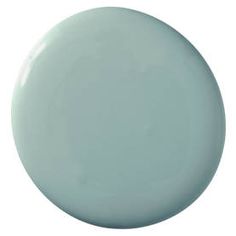 a white round object with a light blue color on the top and bottom half, in front of a white background