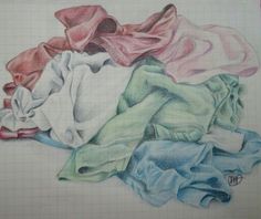 a drawing of some clothes on a piece of paper with colored pencils in it