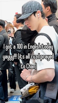 a man in white shirt and black hat with text that reads i got a 100 in english today yay it's all cuz praying to chan