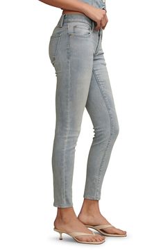 A low-rise waist adds retro-cool vibes to these sleek skinny jeans enhanced with easy stretch. Zip fly with button closure Five-pocket style 91% cotton, 7% polyester, 2% elastane Machine wash, tumble dry Imported Trendy Everyday Bottoms With Standard Cut Leg, Trendy Bottoms With Standard Cut Leg For Everyday, Everyday Mid-rise Slim Fit Bottoms, Everyday Slim Fit Mid-rise Bottoms, Trendy Fitted Washed Pants, Fitted Mid-rise Everyday Bottoms, Fitted Slim Bottoms For Everyday, Washed High Rise Fitted Jeans, High Rise Washed Fitted Jeans