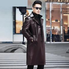 Looking to elevate your winter comfort and style? Your search ends here with this essential trench coat. Meticulously crafted from premium-grade cow leather, this long coat is your go-to option for casual occasions. Its double-layer collar and loose fit not only provide warmth but also exude a fashionable charm. The attractive button embellishments effortlessly create a chic and laid-back style. Leather Long Pea Coat For Fall, Leather Pea Coat For Business In Fall, Fall Leather Pea Coat For Business, Leather Winter Business Outerwear, Leather Business Outerwear For Winter, Leather Pea Coat For Business In Winter, Winter Business Leather Outerwear, Winter Business Long Leather Coat, Leather Long Pea Coat For Winter