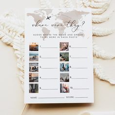 a travel themed wedding game with photos and words on the front, which reads where were they?