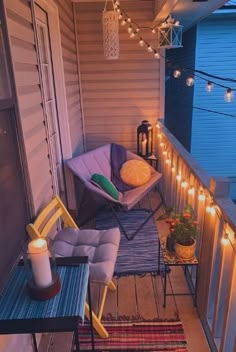 a balcony with lights and chairs on it