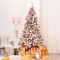 a decorated christmas tree in a living room