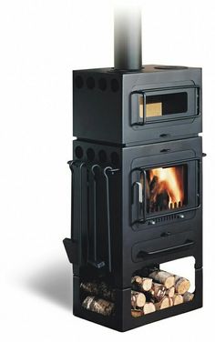 a black stove with logs in front of it