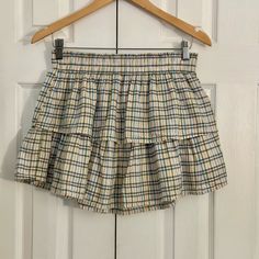 Excellent Condition. Never Worn. New Without Tag. Cream Casual Ruffled Bottoms, Casual Cream Skirt For Brunch, White Eyelet Skirt, Green Plaid Skirt, Printed Mini Skirt, Plaid Pleated Mini Skirt, Twill Skirt, Eyelet Skirt, Tiered Mini Skirt