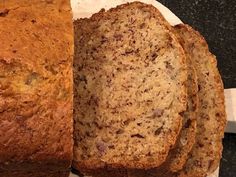 two slices of banana bread sitting on top of a white plate