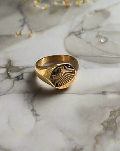 This RAYS OF LOVE SIGNET RING is specifically crafted to emulate the sun's rays. It features a shining sun, perfect for any outfit. This timeless piece is sure to draw attention. 18k gold plated stainless steel waterproof & hypoallergenic sizes 6,7,8,9 packaged in ILLÁRI drawer jewelry box Sun Signet Ring, Gold Sun Ring, Drawer Jewelry, Antique Jewellery Designs, Gold Sun, Fantasy Jewelry, Jewellery Designs, Antique Jewellery, Cleaning Jewelry