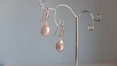 Classic designed , blush baroque pearl earrings with rose gold teardrop shape hooks Perfect for brides, braidsmaids and also for your elegant outfit Baroque pearl size 1,50 cm approx. total lenght of the earring 2,60 cm You will receive the excact pair of pearls in the photos above If you wish more info, do not hesitate to contact me Thank you for visiting my shop Rose Gold Teardrop Earrings With Pearl Drop, Elegant Pink Gold Jewelry With Ear Wire, Elegant Handmade Blush Jewelry, Pink Teardrop Pearl Earrings For Formal Occasions, Rose Gold Teardrop Pearl Earrings With Ear Wire, Elegant Pink Teardrop Pearl Earrings, Elegant Rose Gold Teardrop Pearl Earrings, Elegant Pink Teardrop Earrings, Elegant Pink Gold Pearl Drop Jewelry