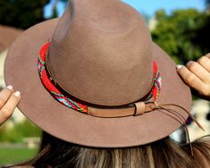 Dress up any hat with this western beaded leather hat band. Beautiful native and Navajo patterns with vibrant colors. Bring a southern charm to your old favorites with this gorgeous hat band or make your new hat even more special. Made of full grain leather (highest grade leather) and glass beads. Handmade in Brazil by artisan women. You can match your hat band with our best-selling leather beaded dog collars! Treated with beeswax, water resistant. 30 days free returns or exchange. 1-year warran Red Vogue, Navajo Pattern, Beaded Dog Collar, Leather Hat, Western Hats, Leather Hats, Beads Handmade, Southern Charm, Bead Leather