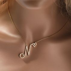 Initial Cursive Letters with Heart Pendant Necklaces Collier Upgrade your jewelry collection with our Initial Cursive Letters with Heart Pendant Necklaces. Crafted with attention to detail, this necklace is a stylish and meaningful accessory that adds a personalized touch to your look. Metals Type: Copper Necklace Type: Pendant Necklaces Material: Cubic Zirconia Shape/pattern: Letter Pendant Size: 2.3cm*2.2cm Chain Type: Link Chain Item Type: Necklaces Available Colors: Silver, Gold, Rose Gold E Rose Gold Initial Necklace, Heart Pendant Necklace Gold, Rose Gold Initial, Alphabet Necklace, Custom Initial Necklace, Cursive Letters, Initial Necklace Gold, Personalized Pendant, Custom Name Necklace