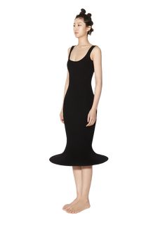 The Knitted Hula Dress blends merino wool and stretch polyester, creating a stretchy hourglass fit that accentuates curves. With built-in boning for the ic... Evening Bodycon Knit Dresses, Evening Knit Bodycon Dress, Fitted Knit Dress For Evening, Fitted Knee-length Knit Midi Dress, Fitted Knee-length Knit Bodycon Dress, Fitted Knit Evening Dress, Evening Fitted Knit Sweater Dress, Fitted Knit Mini Dress For Evening, Fitted Knit Midi Length Dress