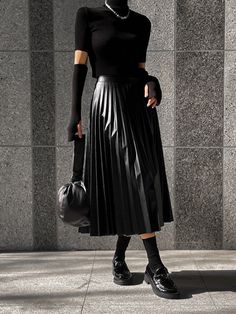 Vegan leather pleated skirt. Flared A Line. Model is in MINUSEY ONE SIZE. ✔️ Free worldwide express shipping over $100✔��️ Loved by 6,500+ customers✔️ Limited edition collections, maximum style⠀⠀⠀⠀⠀⠀⠀⠀⠀Stay ahead of the trend with can’t-find-anywhere-else staples. Your closet will thank you 💕 * MINUSEY ONE SIZE = EU 34-38, US 2-6* 100% PU Leather* Dry clean* Made in Korea - Model Height: 172cm/5'7" (US2, EU34)