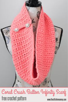 a crochet scarf with buttons is shown on top of a mannequin