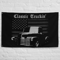 a black and white photo of an old truck with the words classic truckin on it