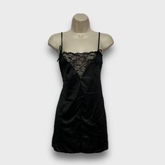 Vintage Lady Cameo Slip / Chemise Size Medium Black, Lace, Spaghetti Straps With Bows, Square Neckline 100% Nylon Good Preowned Condition Approximate Measurements: Garments Are Measured Laying Flat And Unstretched. Length: 30" Armpit To Armpit: 16.5" (33" Bust) Color Of Item/S Might Slightly Vary Across Different Devices Due To Screen Setting Variations. Pet Friendly Home. I Live With A Smoker. My Items Are Laundered/Cleaned (Except Nwt Or Nwot), Sometimes Using Scented Laundry/Cleaning Products Fitted Sleeveless Chemise For Night Out, Fitted Lace Trim Chemise For Night Out, Fitted Black Lace Trim Sleepwear, Black Fitted Chemise For Loungewear, Coquette Chemise With Lace Trim For Night Out, Coquette Satin Sleepwear For Night Out, Black Satin Sleepwear With Lace Trim, Black Fitted Party Chemise, Fitted Chemise With Built-in Bra For Night Out