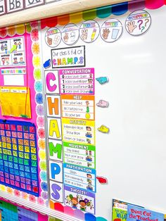 a bulletin board with colorful writing on it