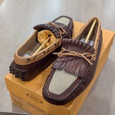 Up For Sale Is A Pair Of Men's Tod's Two Tone Tassel Leather Loafers/Drivers. Size: Uk 9 Us 10 Style: Brown Multi Leather Upper Moc Toe Slip-On Style Lining: Leather Trim: Textile Leather & Synthetic Sole Made In Italy Retail Price: $675 Luxury Brown Slip-on Moccasins, Brown Leather Tassel Loafers Slip-on, Designer Brown Slip-on Loafers, Luxury Brown Tassel Loafers With Goodyear Welted, Brown Leather Tassel Loafers With Plain Toe, Brown Leather Tassel Loafers With Round Toe, Brown Leather Tassel Loafers With Rubber Sole, Brown Calf Leather Moccasins With Brogue Detailing, Goodyear Welted Leather Moccasins For Fall