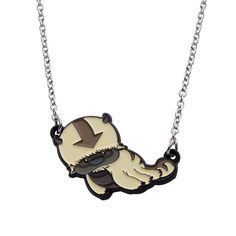 a necklace with a cartoon dog on it's face and an arrow in the middle