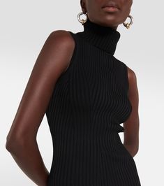 Callum Ribbed Knit Turtleneck Minidress in Black - Staud | Mytheresa Chic Stretch Sweater Dress With Turtleneck, Ribbed Knit Turtleneck, Ribbed Turtleneck Mini Dress For Fall, Turtleneck Mini Dress For Work, Ribbed Mini Dress For Workwear, Chic Turtleneck Mini Dress For Work, Elegant Fitted Turtleneck With Ribbed Neckline, Chic Ribbed Turtleneck With Funnel Neck, Stretch Turtleneck Sweater Dress