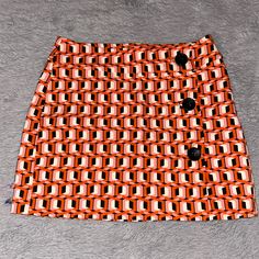 Bershka 60s Style Pink And Orange Pattern Mini Skirt With Black Buttons. Top Button Can Unclasp. New With Tags, Never Worn. Length Is 13.7 Inches. Can Fit Both Xs And S. Pairs Great With A Sweat And Boots! Pattern Mini Skirt, 60’s Style, 60s Style, Orange Pattern, Style Pink, 60s Fashion, Black Button, Nom Nom, Pink And Orange