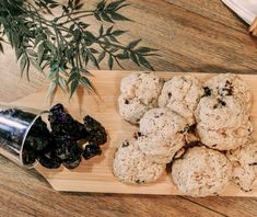 cookies and raisins on a wooden cutting board