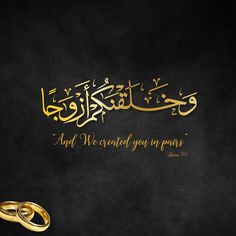 an arabic calligraphy with two gold wedding rings on a black background and the words, and we created you in pairs