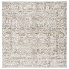 an antique style rug in grey and beige tones with white trimmings on the edges