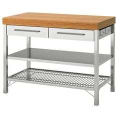 a kitchen island with two drawers and one shelf