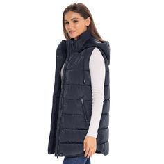 This S.E.B. by SEBBY outerwear vest for women offers a feminine and flattering fit at a great price point. Bringing designer details and all-around comfort, this womens puffer jacket vest will not disappoint. It features a detachable hood for added warmth and protection from light showers. The snaps and zipper are a stunning gunmetal finish for a very refined look. This vest can be worn as a fall coat and right into the winter as true outerwear. The loose quilted faux down insulation imparts a s Long Puffer Vest, Puffer Jacket Vest, Womens Puffer Jacket, Puffer Vest With Hood, Vest For Women, Long Puffer, Puffer Jacket Women, Jacket Vest, Outerwear Vest