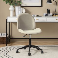 a white desk chair sitting on top of a rug