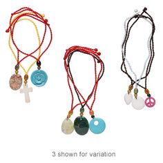 three necklaces with different colored beads and charms on each one side, including a cross