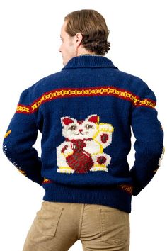 Hand knit to order Maneki-Neko SweaterLucky CatHad a run of bad luck lately? Let our absurdly cute kitschy knit sweater come to your rescue. It features Maneki-Neko, Japan’s famous beckoning cat, which doubles as a lucky charm and good fortune talisman.And to maximize the good luck factor, we took the famed vintage Mary Maxim Angler’s Pride knit design and added it to the sweater’s sleeves – because cats love fish, right?All of our knits are handmade in the Andes Mountains by a cooperative of in Winter Sweater With Cat Design, Cat Cardigan, Beckoning Cat, Mary Maxim, Sweater Christmas, Maneki Neko, Lucky Cat, Sweater Making, Sweater Sleeves