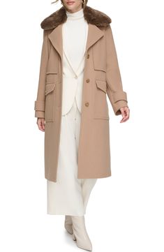 Stay warm in this wool-blend twill coat constructed with a removable faux-fur collar, notched lapels, front button-flap pockets and a back vented hem. 42" length Front button closure Notched lapels Front button-flap pockets Polyurethane backing 53% wool, 38% polyester, 9% other fibers with 100% polyester faux fur Dry clean Imported Model stats: 5'10" height, 32" bust, 25" waist, 36" hip. Model is wearing size Small. Elegant Winter Outerwear With Flap Pockets, Beige Single Breasted Collared Pea Coat, Long Wool Coat With Faux Fur Trim For Work, Beige Wool Coat With Lapel Collar And Pockets, Workwear Long Wool Coat With Faux Fur Trim, Winter Office Outerwear With Flap Pockets, Classic Wool Coat With Faux Fur Trim For Fall, Beige Outerwear With Faux Fur Trim For Work, Long Coat With Faux Fur Trim For Work