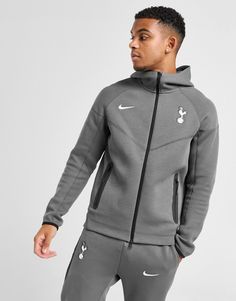 Layer up on matchday in this men's Tottenham Hotspur FC Tech Fleece Full Zip Hoodie from Nike. In a Dark Grey colourway, this standard fit hoodie is cut from Nike's iconic Tech Fleece for total comfort. It features a hood and full-zip fastening for coverage, with elasticated cuffs to hold the shape and side pockets for stashing your stadium essentials. Signed off with the Spurs crest and Nike Swoosh to the chest. Machine washable. Nike React Vision, 270 Nike, Tottenham Hotspur Fc, Chest Machine, Football Training, Tech Fleece, Grey Nikes, Nike Swoosh, Tottenham Hotspur