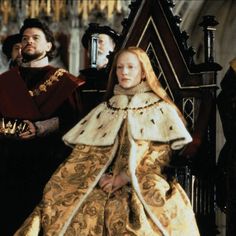 the tudors are dressed in period costumes