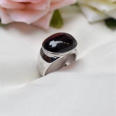 D E T A I L S - Stone: Natural Garnet Stone Size: 13x18mm Metal: 925 Sterling silver The Fit: True to US ring size Finish: Silver & Smooth S H I P P I N G & P R O D U C T I O N - My current production time is 2-6 business days, which means after those days are up, your order ships! I make everything custom to order, by hand, but I promise you it's worth the wait! R U S H - M Y - O R D E R - If you're in a rush to get your pretty new pieces, please send me a message and I'll let you know Formal Silver Ruby Ring With Polished Finish, Modern Silver Ruby Ring For Formal Occasions, Modern Silver Ruby Ring With Polished Finish, Classic Silver Amethyst Ring With Polished Finish, Modern Silver Ruby Ring With Oval Shape, Formal Silver Amethyst Open Ring, Silver Amethyst Ring With Polished Finish For Anniversary, Classic Amethyst Ring With Polished Finish As Gift, Classic Polished Amethyst Ring For Gift