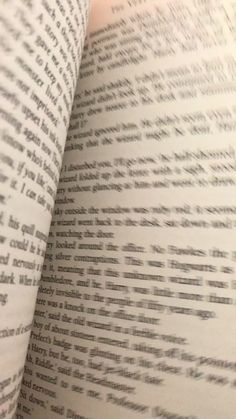 an open book that has some type of text on it, and the pages are lined up in rows