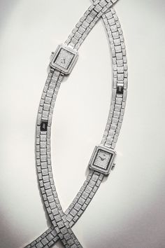 Infinitely classic in nature, Arc Double invites you to question the concept of time as you know it. The unisex watch is veiled in 1695 crystals, featuring a double wrap bracelet, and a jewel-like 23 MM X 25 MM rectangular case with 12 genuine diamonds marking each hour on the face. Enter the time loop and get wrapped up in your story’s Arc. Timeless Diamond Watch For Everyday Luxury, Timeless Rectangular Jewelry And Watches For Evening, Luxury Rectangular Diamond Watch With Diamond Accents, Modern Diamond Watch For Evening, Elegant Rectangular Jewelry With Diamond Hour Markers, Diamond Jewelry With Rectangular Dial For Evening, Evening Diamond Jewelry With Rectangular Dial, Luxury Jewelry With Diamond Hour Markers And Rectangular Dial, Luxury Rectangular Watch With Diamond Hour Markers