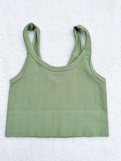 ☀Features: It is stretchy fits sizes XS-L ☀Details: Fabric: 92% Nylon / 8% Spandex Made in USA Green Seamless Yoga Top, Summer Seamless Racerback Top, Seamless Racerback Top For Summer, Green Seamless Tops For Workout, Green Seamless Stretch Top, Casual Tops With Seamless Design And Tank Straps, Green Stretch Crop Top For Yoga, Versatile Green Seamless Tops, Seamless Summer Gym Tops